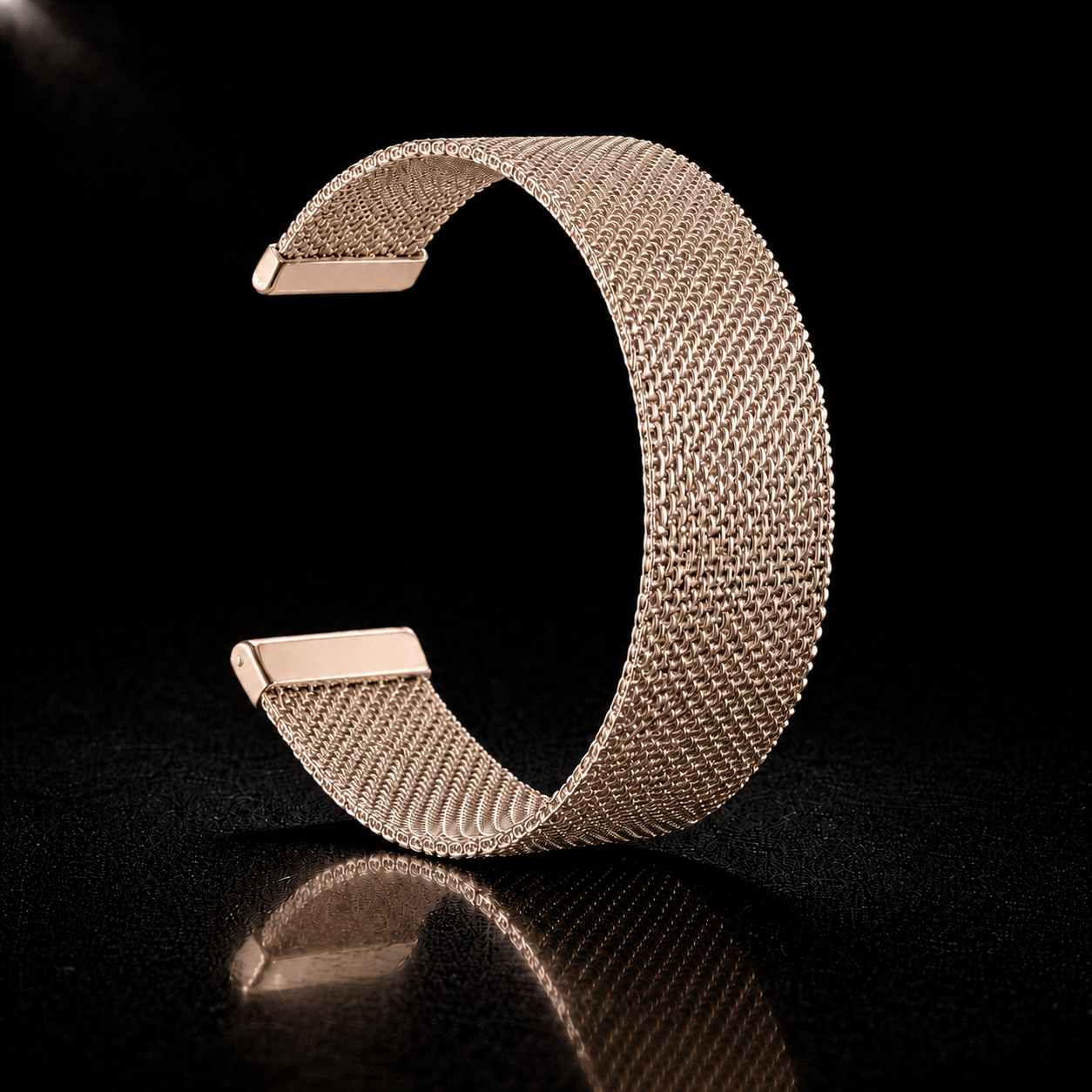 Rose gold NOVACCHI Milanese Mesh Band curved upright on a black reflective background