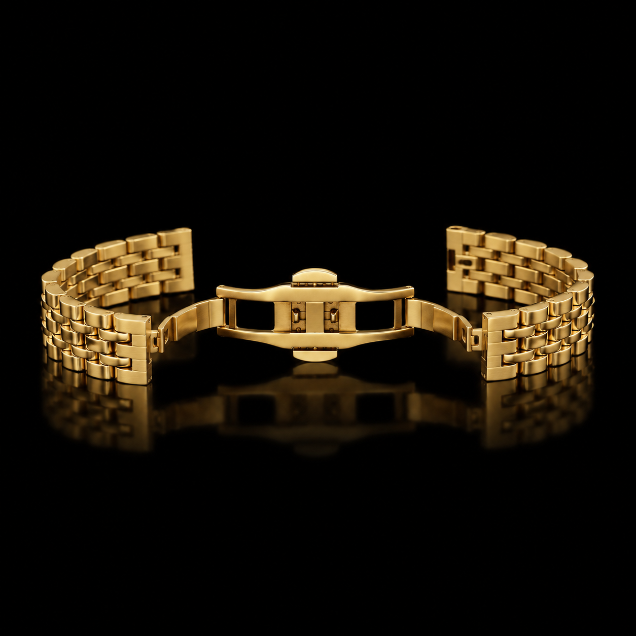 Gold Luxe Butterfly Link Watch Band laid open to show the butterfly clasp on a black reflective background