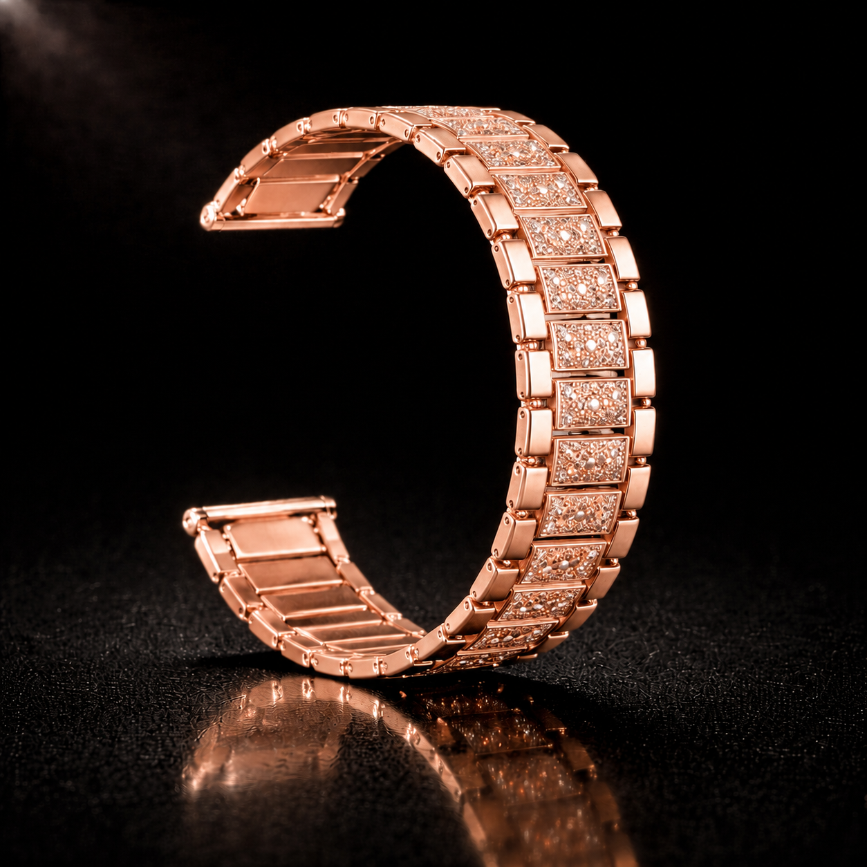 Rose gold NOVACCHI Crystal Pavé Watch Band curved upright with sparkling crystal-set links on a black reflective background